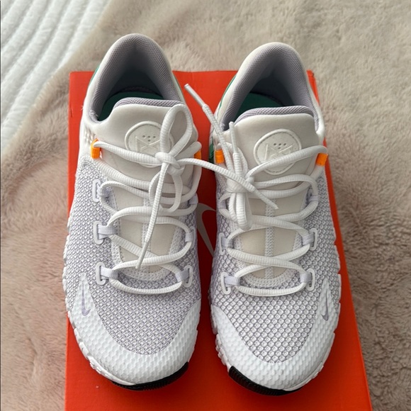 Nike Shoes - Nike White and Orange Athletic Shoes Sleek Design